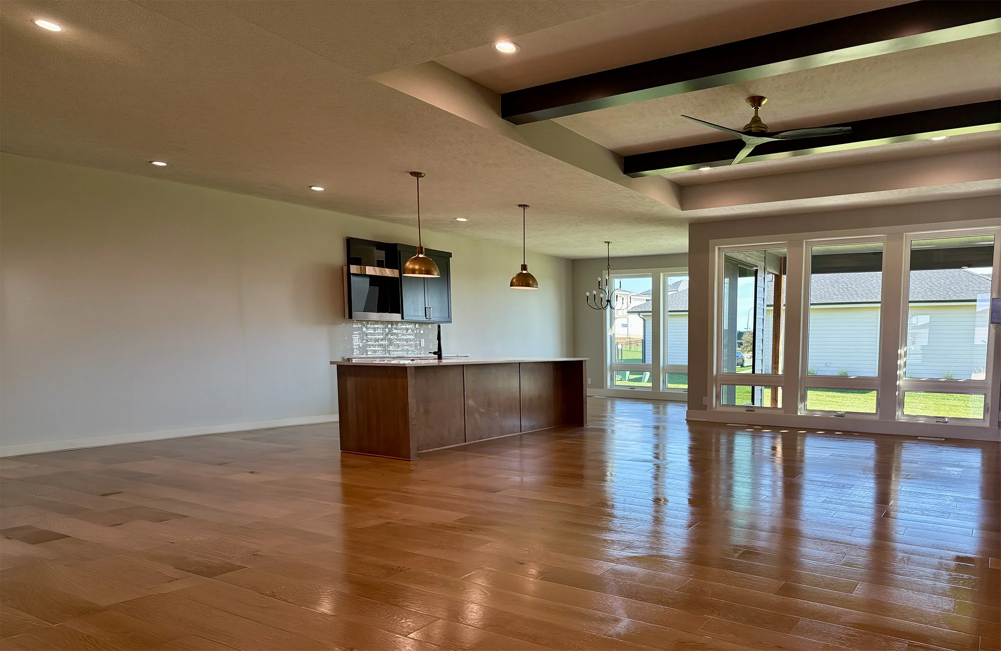 Spacious clean luxury home interior with hardwood floors